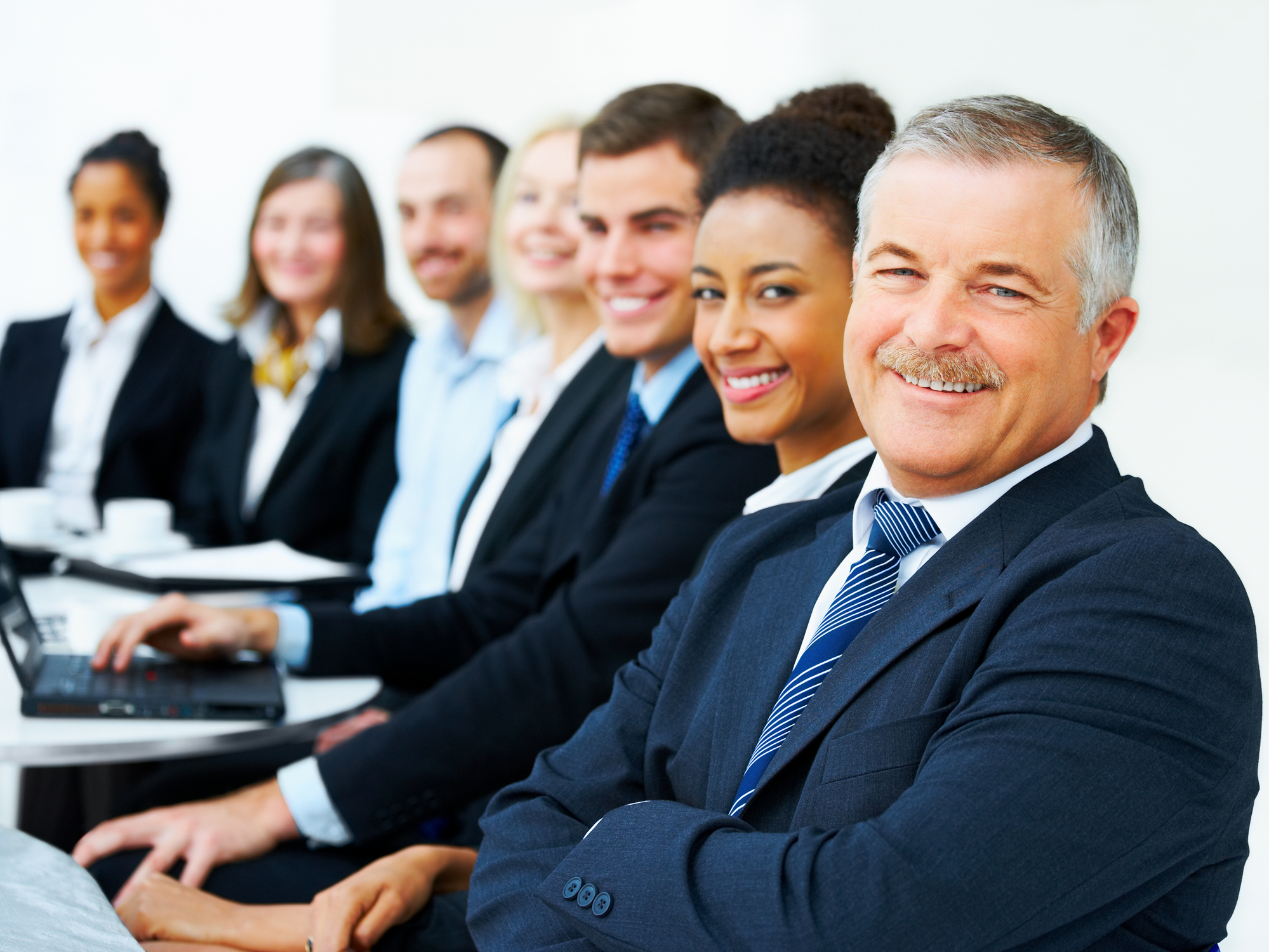 Business people smiling in a meeting